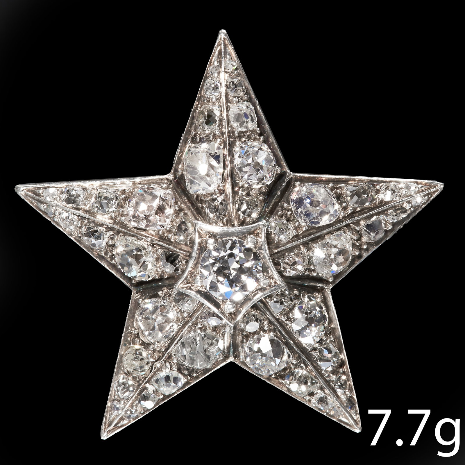 UNUSUAL ANTIQUE DIAMOND STAR BROOCH (1 of 1)