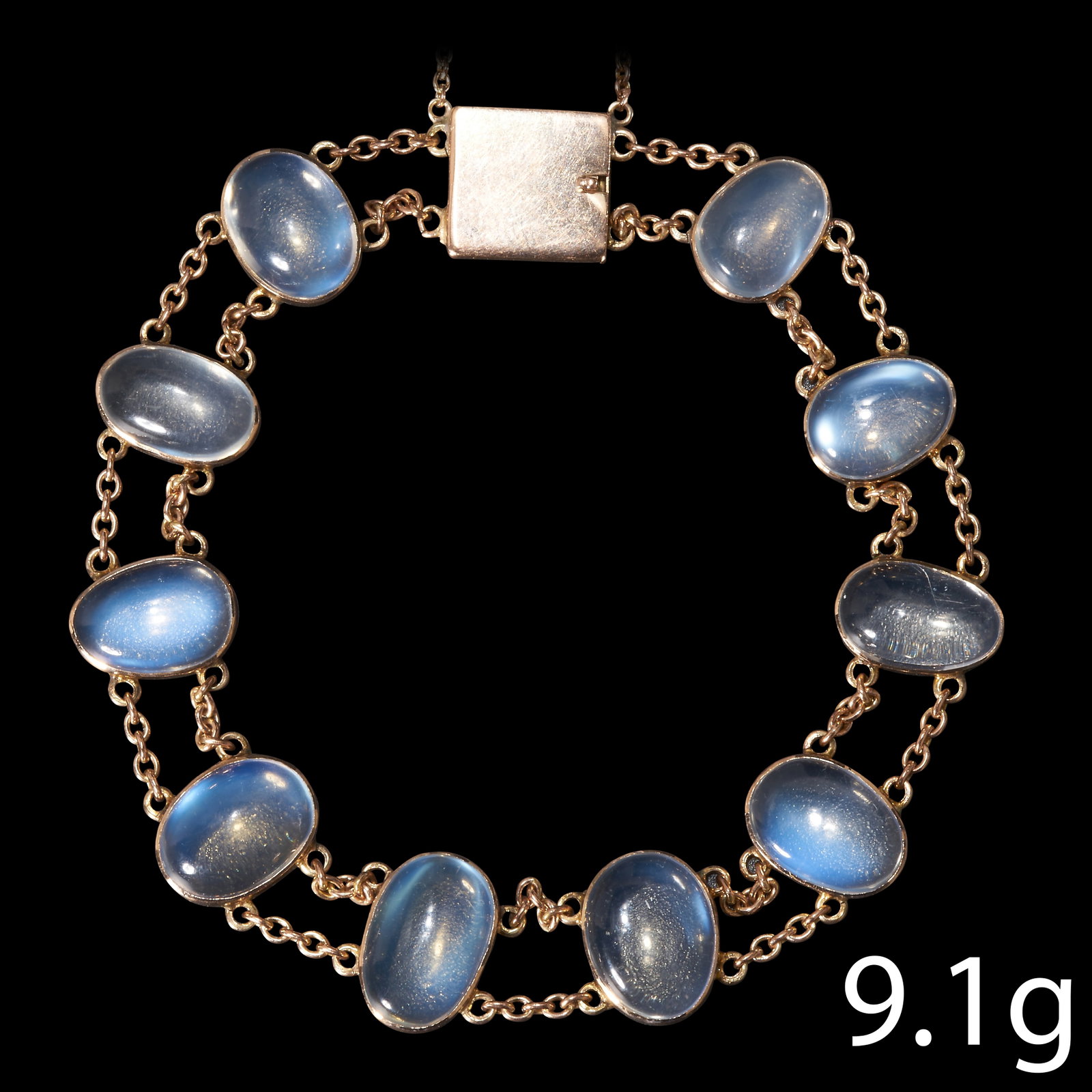 EDWARDIAN MOONSTONE GOLD BRACELET,: EDWARDIAN MOONSTONE GOLD BRACELET,Moonstones well matched, nice blue shiller.L. 18 cm.9.1 grams.