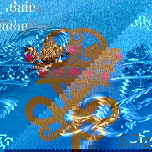 JOHN BROGDEN, FINE ANTIQUE RUBY CROWN STICK PIN: JOHN BROGDEN, FINE ANTIQUE RUBY CROWN STICK PIN,High carat goldThe crown set with rubies.Signed Brogden.L. head 2 cm.5.7 grams.