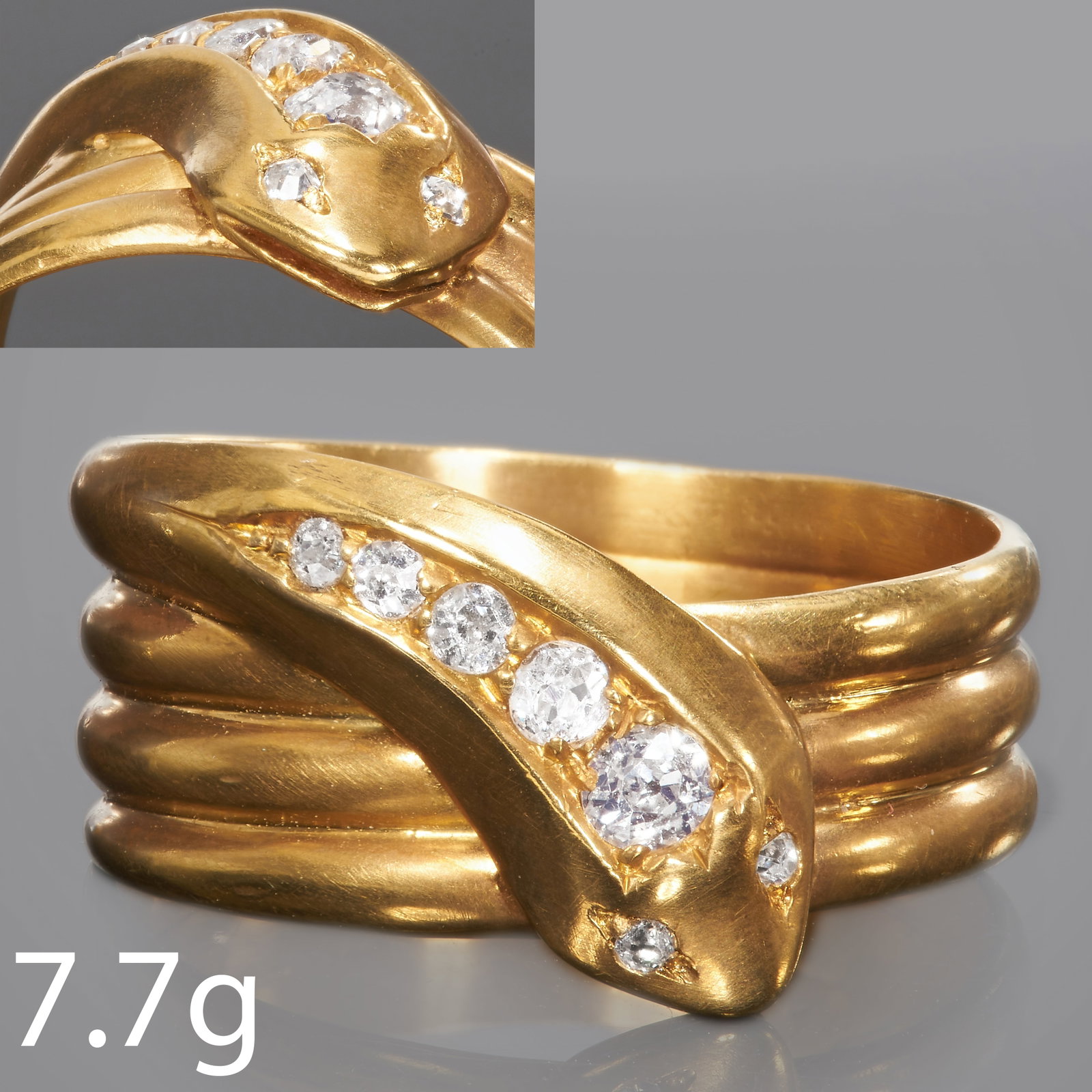 DIAMOND SNAKE RING: DIAMOND SNAKE RING,18 ct. gold.coiled design.Diamonds bright and lively.Size T 1/2.7.7 grams.