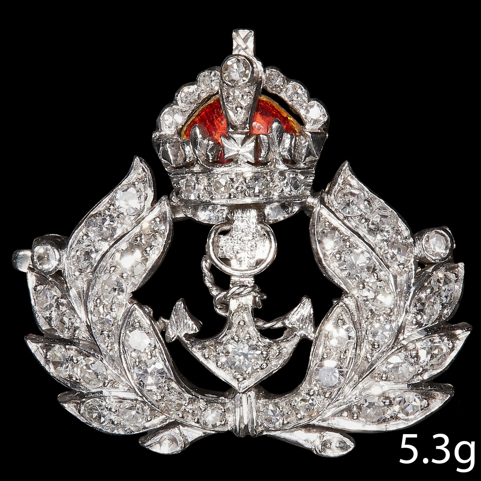 ANTIQUE ENAMEL AND DIAMOND ROYAL NAVY SWEETHEART BROOCH: ANTIQUE ENAMEL AND DIAMOND ROYAL NAVY SWEETHEART BROOCH,5.3 grams, testing as 18 ct. gold.Set with bright and lively diamonds.Lovely enamelled crown, enamel in good condition.W. 2.3 cm.With fitted box