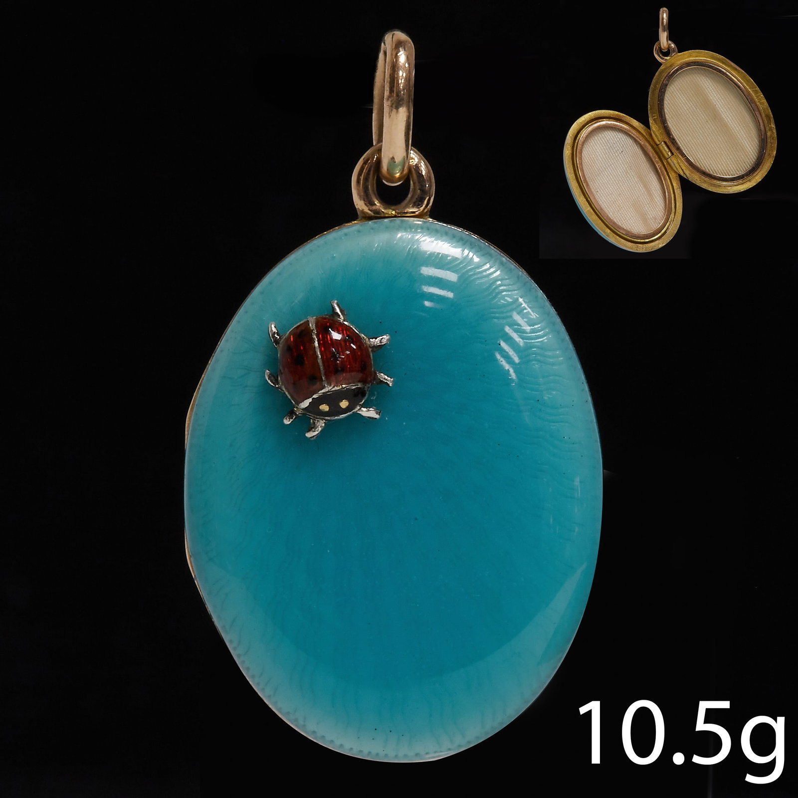 FINE ENAMEL AND LADYBUG LOCKET PENDAN: FINE ENAMEL AND LADYBUG LOCKET PENDANT,10.5 grams, High carat gold.Indistinct marked, likely Russian.Lovely detailed ladybug.L. 3.5 cm.