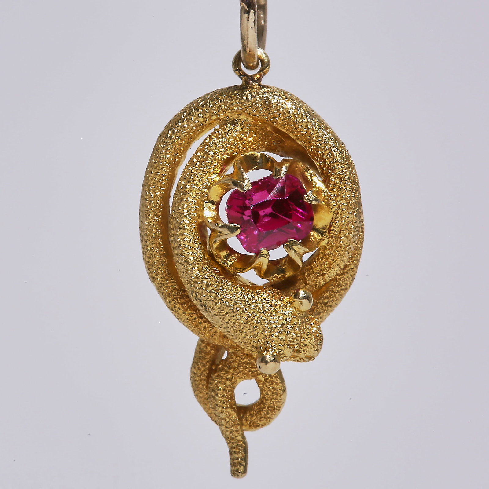 RUBY SNAKE GOLD PENDANT: RUBY SNAKE GOLD PENDANT,Vibrant ruby.