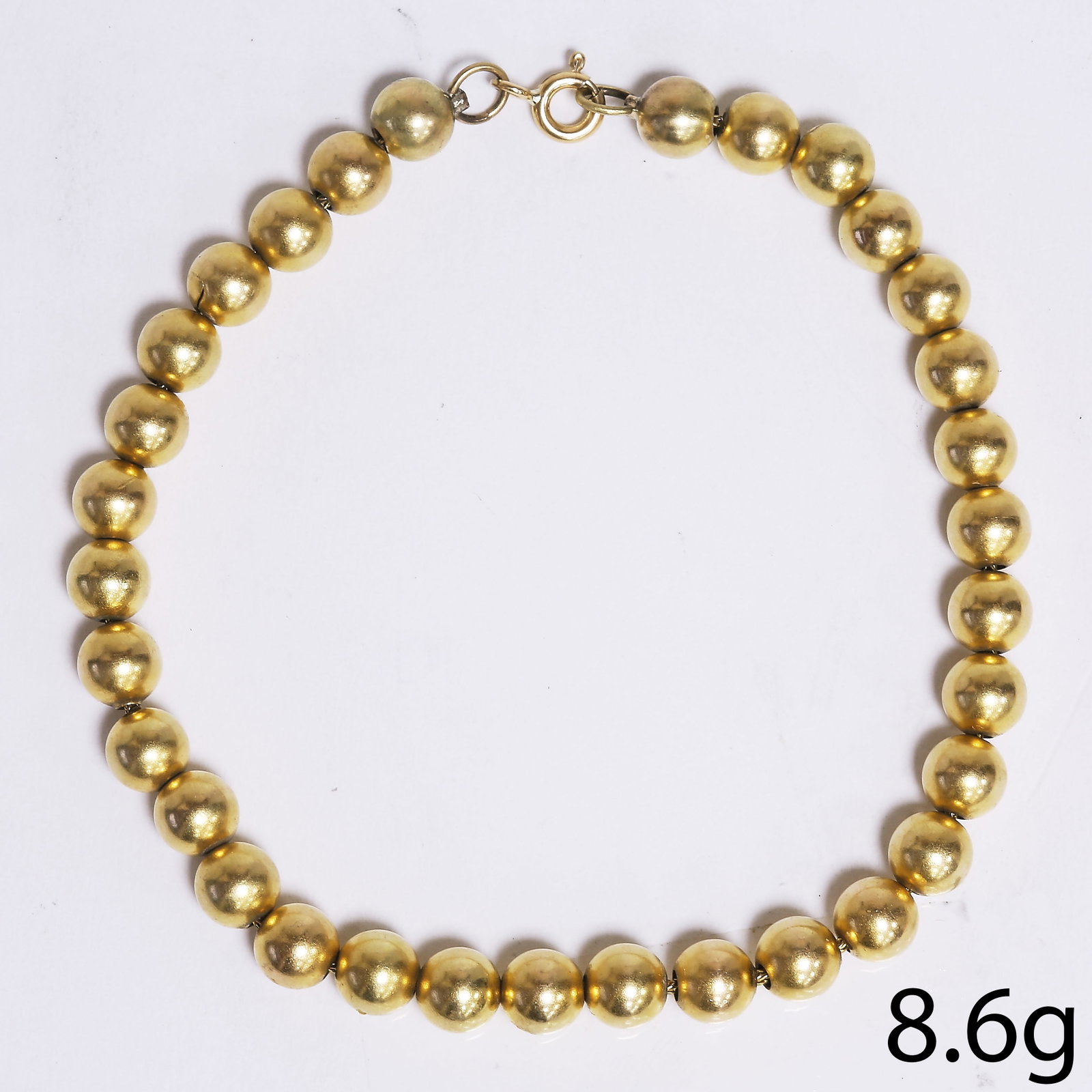 BALL LINK BRACELET: BALL LINK BRACELET,9.5 grams, testing 15 ct. gold.L. 19.5 cm.