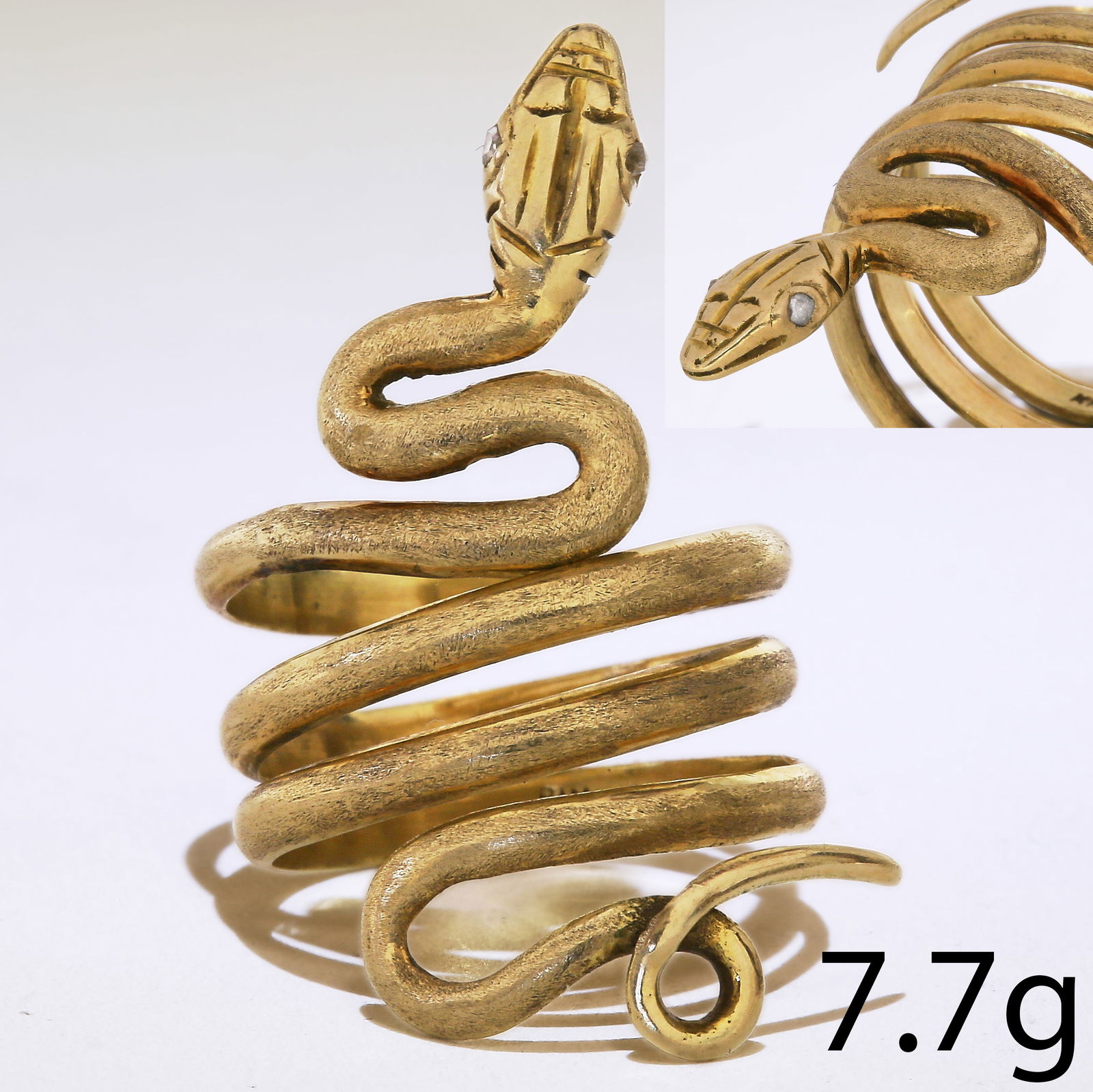 DIAMOND SNAKE RING: DIAMOND SNAKE RING,7.7 grams, 18 ct. gold.Diamond set eyes.Size M 1/2.