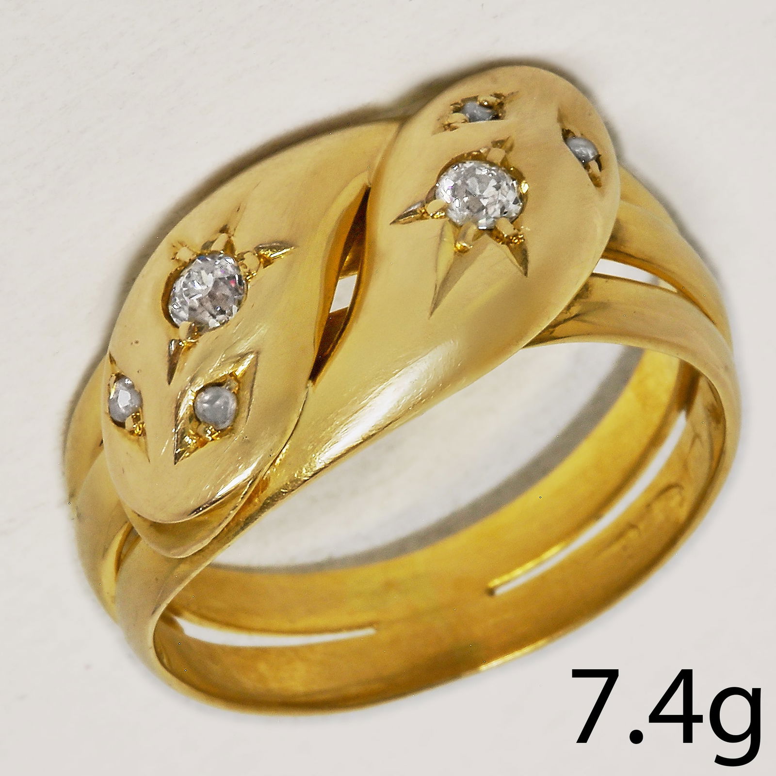 ANTIQUE DIAMOND SET DOUBLE SNAKE RING: ANTIQUE DIAMOND SET DOUBLE SNAKE RING 7.4 grams high carat gold bright lively diamonds size O