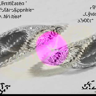 A FANTASTIC CERTIFICATED CEYLON NO HEAT STAR SAPPHIRE AND DIAMOND RING: A FANTASTIC CERTIFICATED CEYLON NO HEAT STAR SAPPHIRE AND DIAMOND RING 6.2 grams platinum beautiful star sapphire with a visible star bright lively diamonds size O for certificate details, see photos