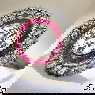 EDWARDIAN RUBY AND DIAMOND CLUSTER RING: EDWARDIAN RUBY AND DIAMOND CLUSTER RING,5.1 grams, testing high carat gold and platinum.Central diamond of approx. 1.15 ct. In our opinion G-H, VS.Diamonds totalling approx. 1.60 ct.Vibrant rubies.Siz