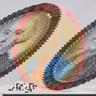 JOHN SMART (1741-1811), PORTRAIT MINIATURE OF A GENTLEMAN: JOHN SMART (1741-1811), PORTRAIT MINIATURE OF A GENTLEMAN,24.7 grams.The gentleman wearing a blue coat and red waistcoat.The surmount set with garnets.Signed I Smart Pinx.L. 4.7 cm.