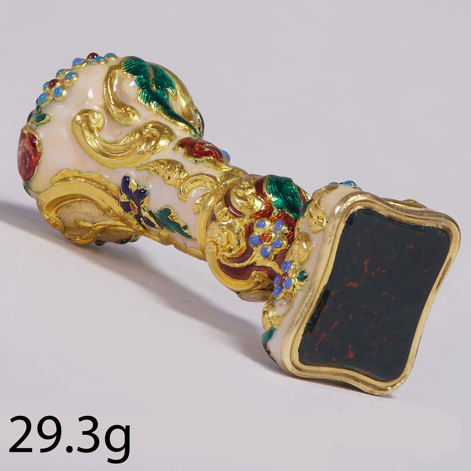 MAGNIFICENT 19TH CENTURY ENAMEL SEAL: MAGNIFICENT 19TH CENTURY ENAMEL SEAL.29.3 grams, testing 18 ct. gold. Fine multi colour enamel, enamel in great condition.Bloodstone seal plaque.L seal 5.5 cm, Fitted case.