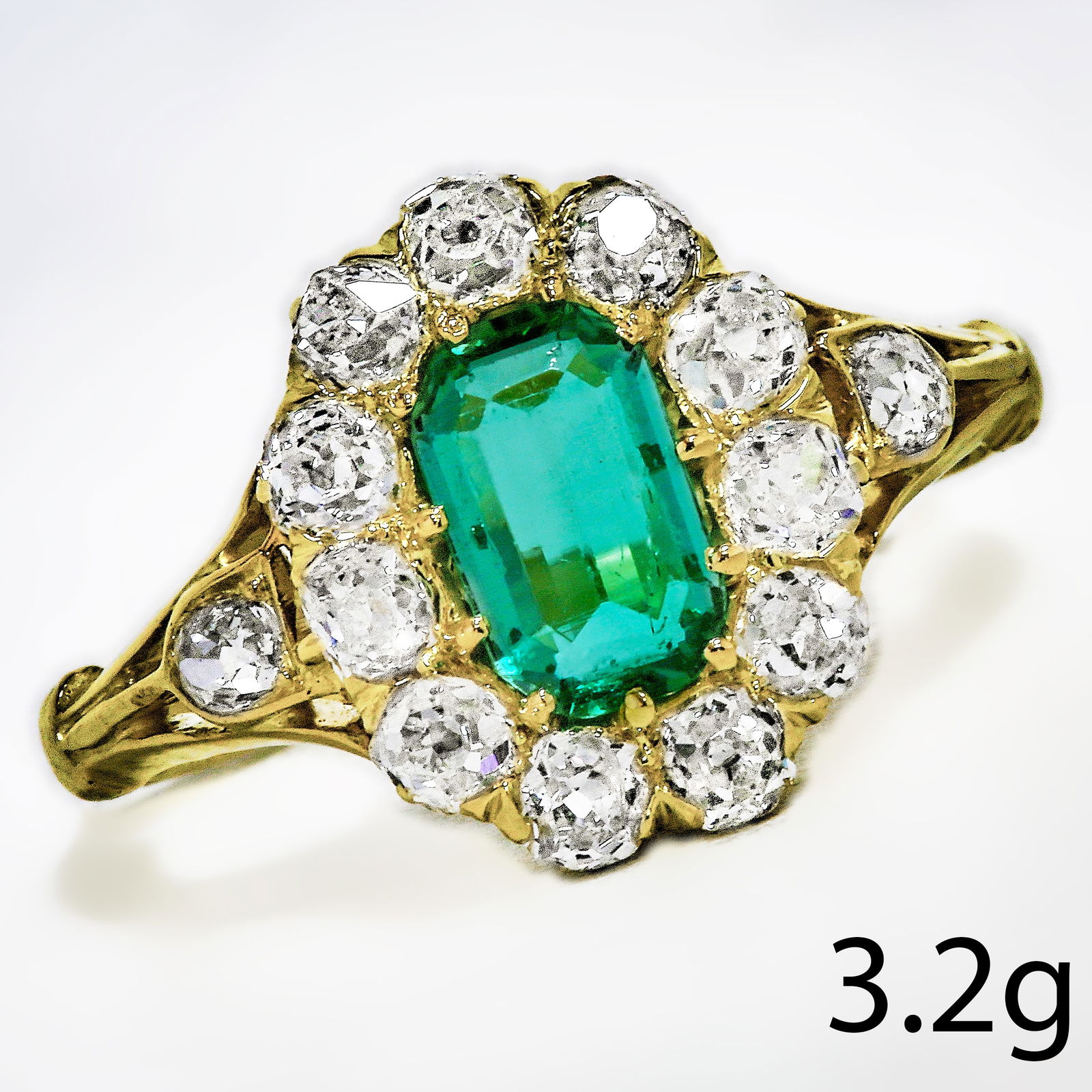 ELEGANT EMERALD AND DIAMOND CLUSTER RING (1 of 1)