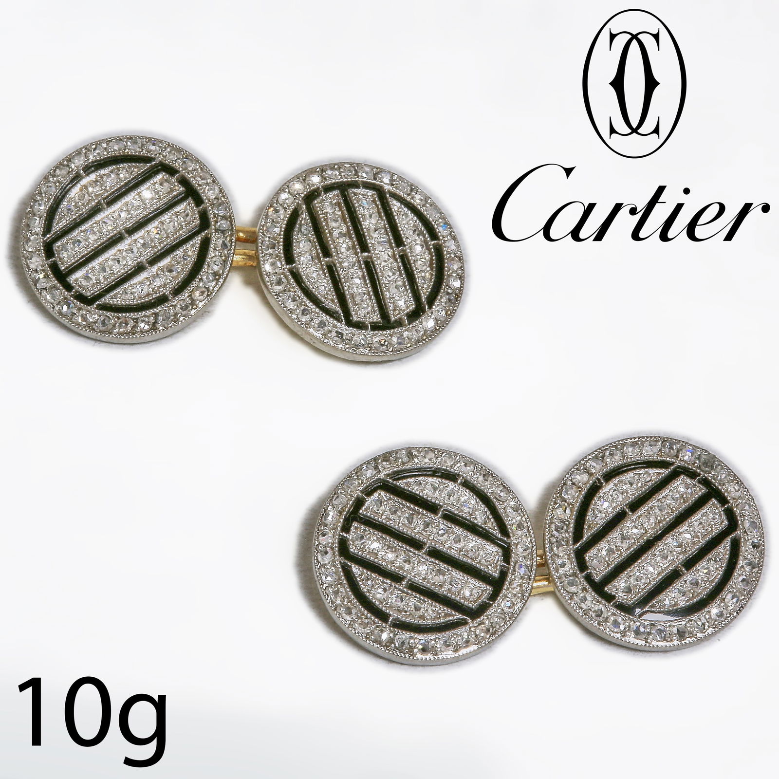 CARTIER, PAIR OF ONYX AND DIAMOND CUFFLINKS
