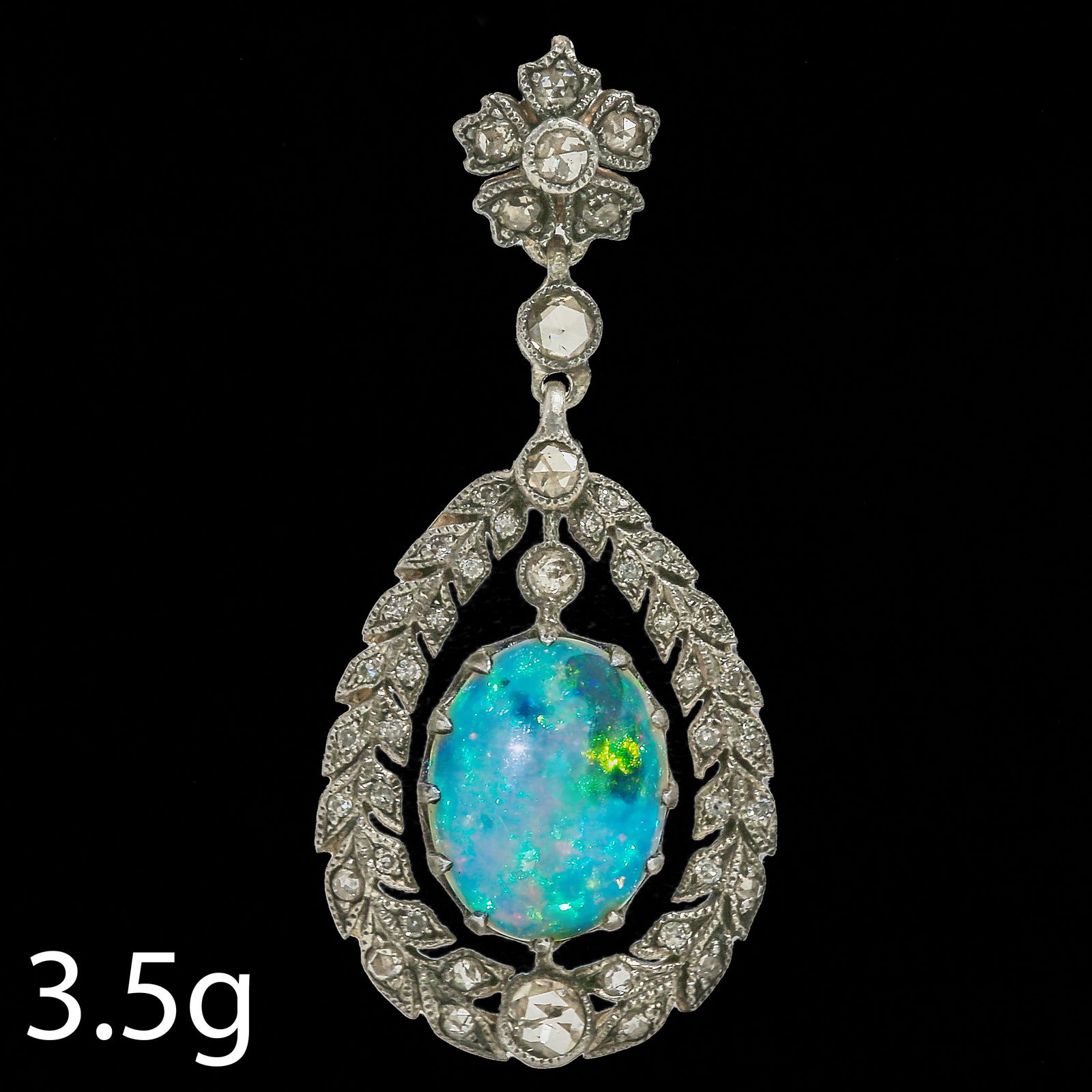BELLE EPOQUE OPAL AND DIAMOND PENDANT: BELLE EPOQUE OPAL AND DIAMOND PENDANT,3,5 grams.Rich and vibrant opal with good play of colour.Diamonds bright and lively.L. 3.8 cm.