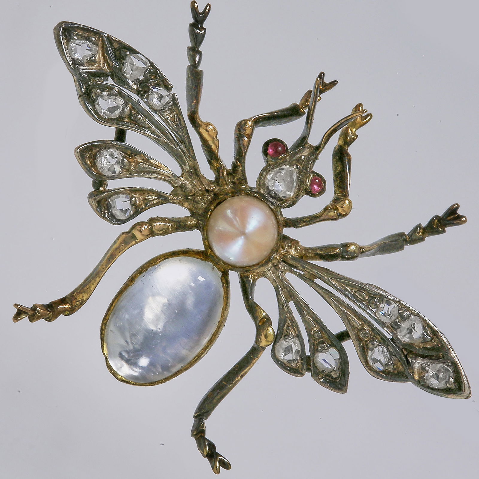 VICTORIAN MOONSTONE AND DIAMOND FLY BROOCH: VICTORIAN MOONSTONE AND DIAMOND FLY BROOCH,6 grams.Vibrant moonstone.Diamonds bright and lively.W. 3.8 cm.