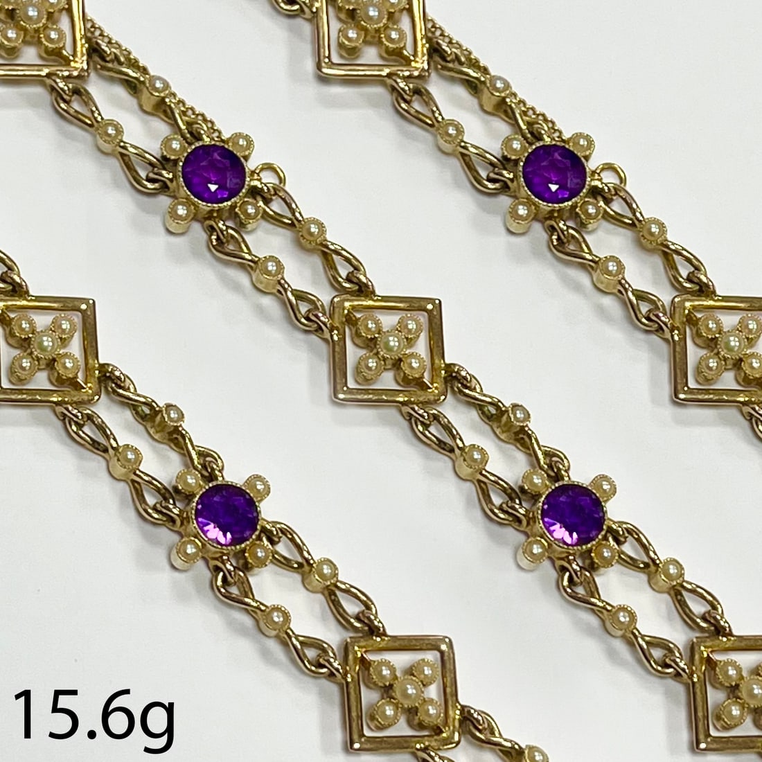 ART-NOUVEAU AMETHYST AND PEARL BRACELET: ART-NOUVEAU AMETHYST AND PEARL BRACELET,15,6 grams, 15 ct. gold.Rich and vibrant amethyst.Pearls generally well matched.L. 17.5 cm.