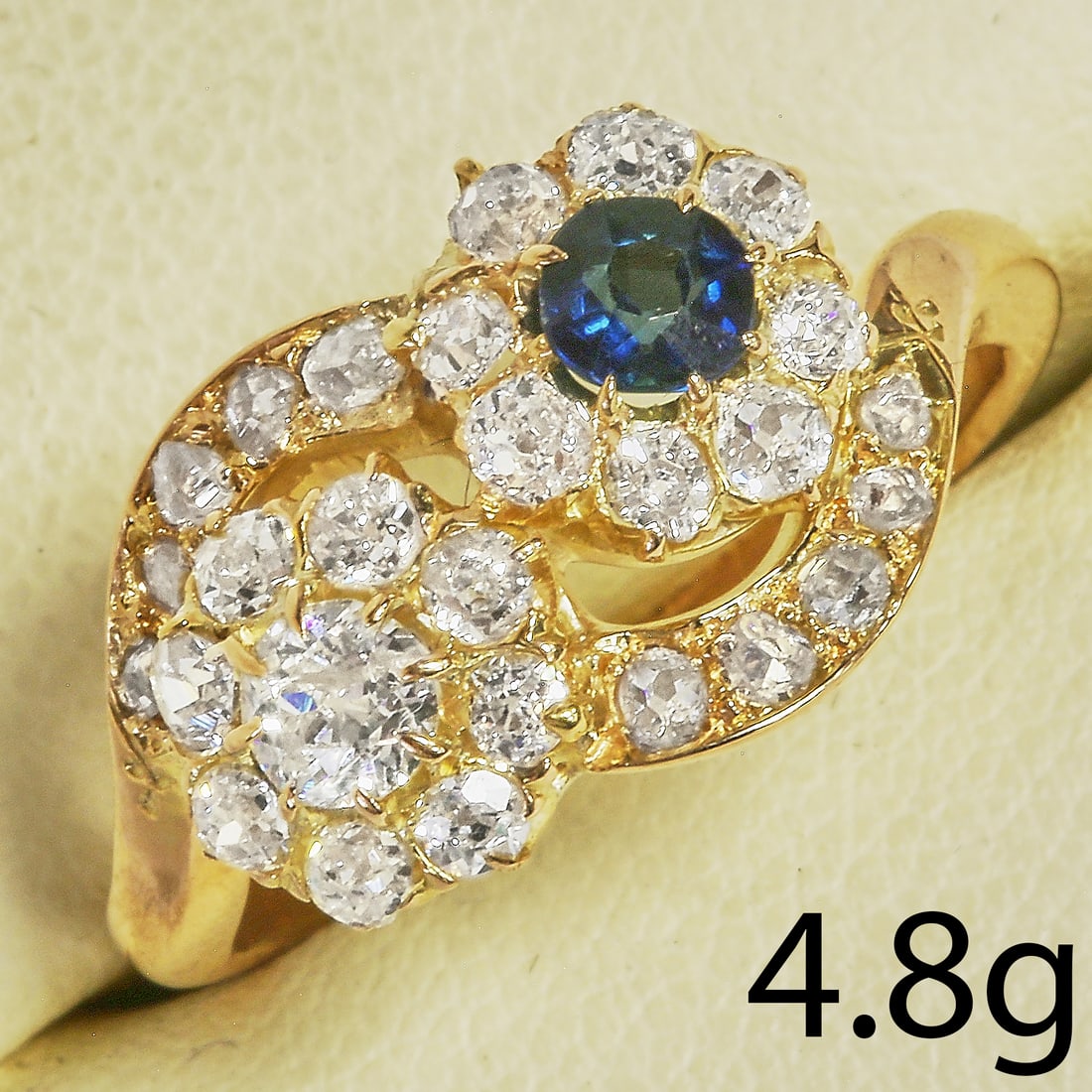 SAPPHIRE AND DIAMOND TOI-ET-MOI CLUSTER RING: SAPPHIRE AND DIAMOND TOI-ET-MOI CLUSTER RING,4,8 grams, testing high carat gold.Diamonds bright and lively.Rich and vibrant sapphire.Size N.