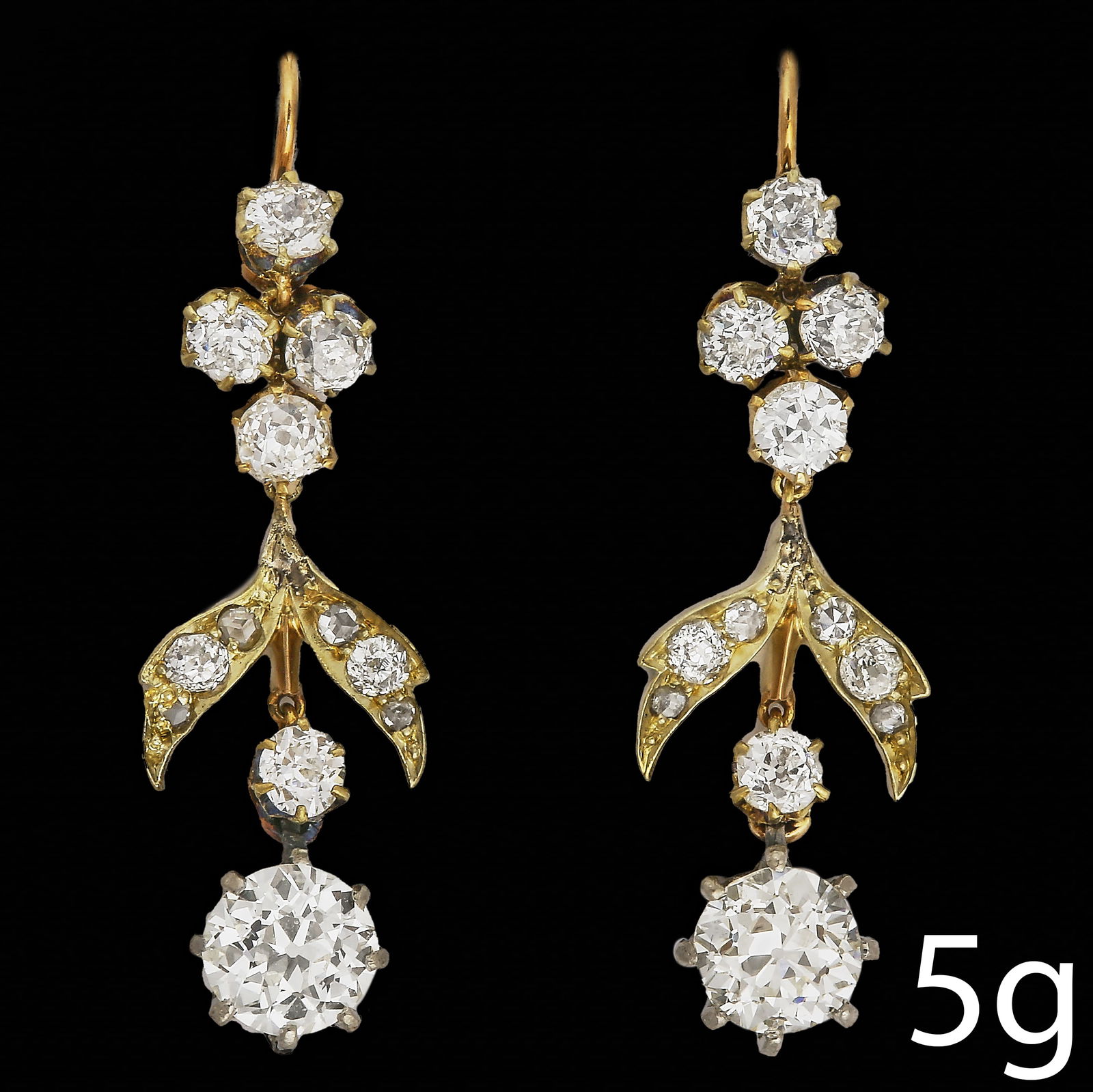 PAIR OF DIAMOND DROP EARRINGS: PAIR OF DIAMOND DROP EARRINGS,5 grams, testing high carat gold.Diamonds right and lively, Principal diamonds of approx. 0.95 and 0.91 ct.L. 3.6 cm.