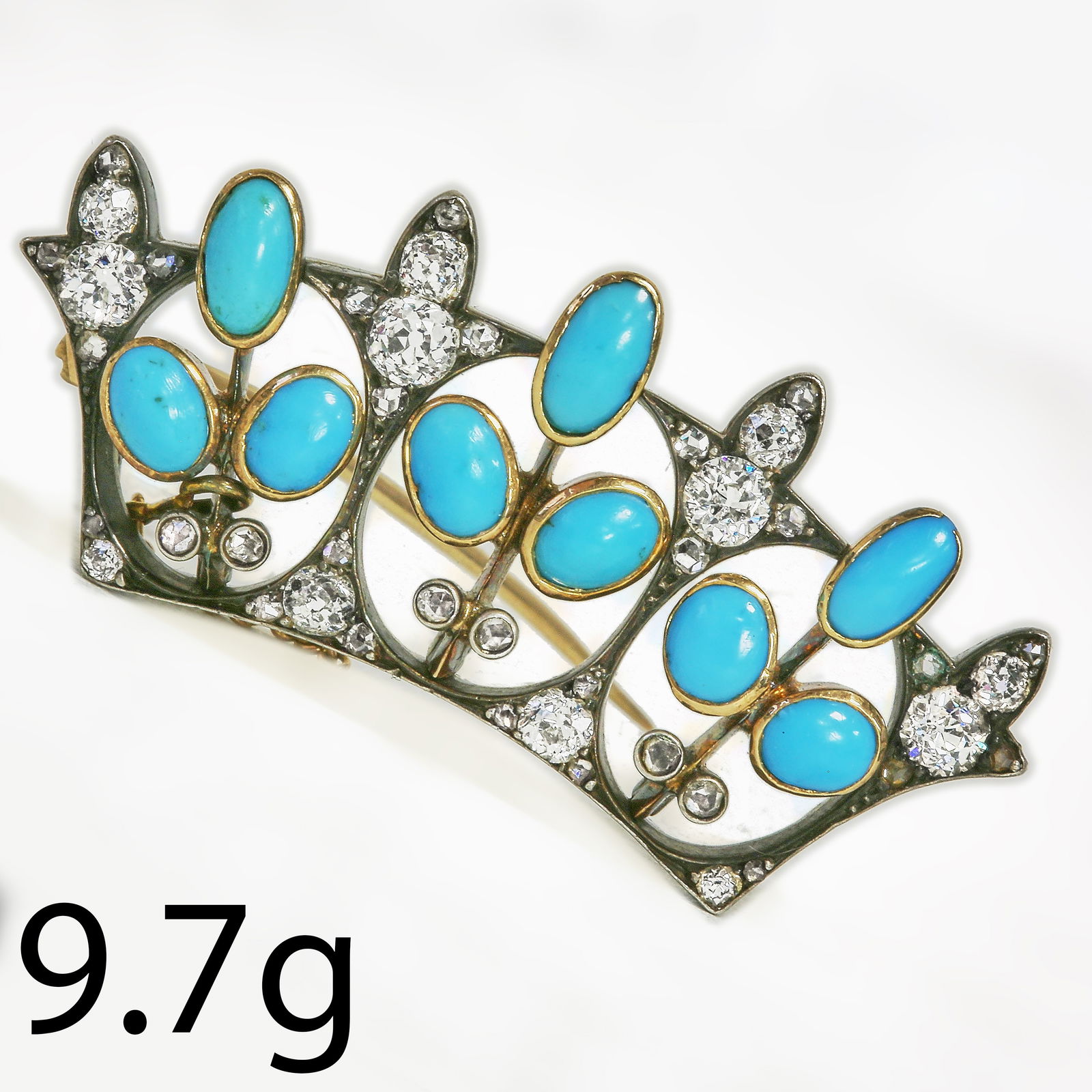 FINE TURQUOISE AND DIAMOND CROWN BROOCH: FINE TURQUOISE AND DIAMOND CROWN BROOCH,9.7 grams, testing high carat gold and silver.Diamonds bright and lively, totalling approx. 1.65 ct.W. 4.5 cm.