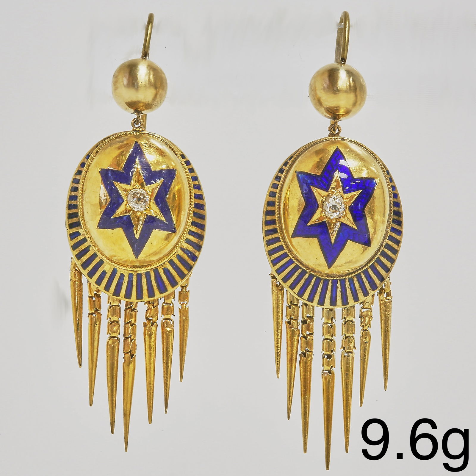 PAIR OF VICTORIAN ENAMEL AND DIAMOND TASSLE DROP EARRINGS: PAIR OF VICTORIAN ENAMEL AND DIAMOND TASSLE DROP EARRINGS,9.6 grams, testing high carat gold.Lovely deep blue enamel.Diamonds bright and lively.L. 4,3 cm.