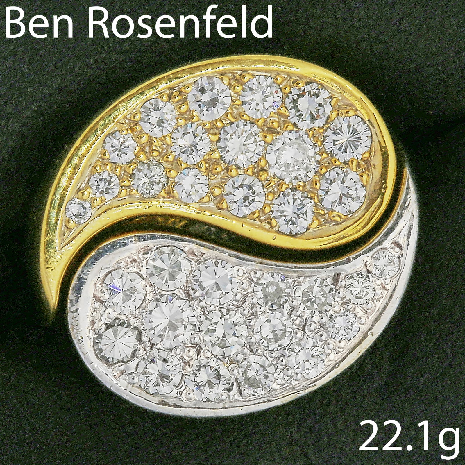 BEN ROSENFELD, DIAMOND YIN YANG RING: BEN ROSENFELD, DIAMOND YIN YANG RING,22,1 grams, 18 ct. gold.Designed as 2 interlocking rings as Ying and Yang.Diamonds bright and lively, totalling approx. 2.10 ct.Signed BRLD.Size M.