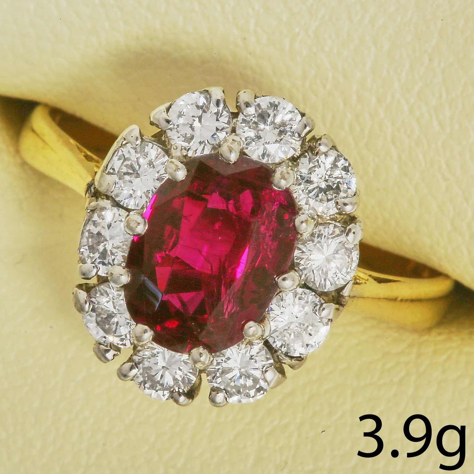 RUBY AND DIAMOND CLUSTER RING: RUBY AND DIAMOND CLUSTER RING 3.9 grams 18 ct rich vibrant ruby with no abrasions approx 2.13 ct bright lively diamonds size O 1/2