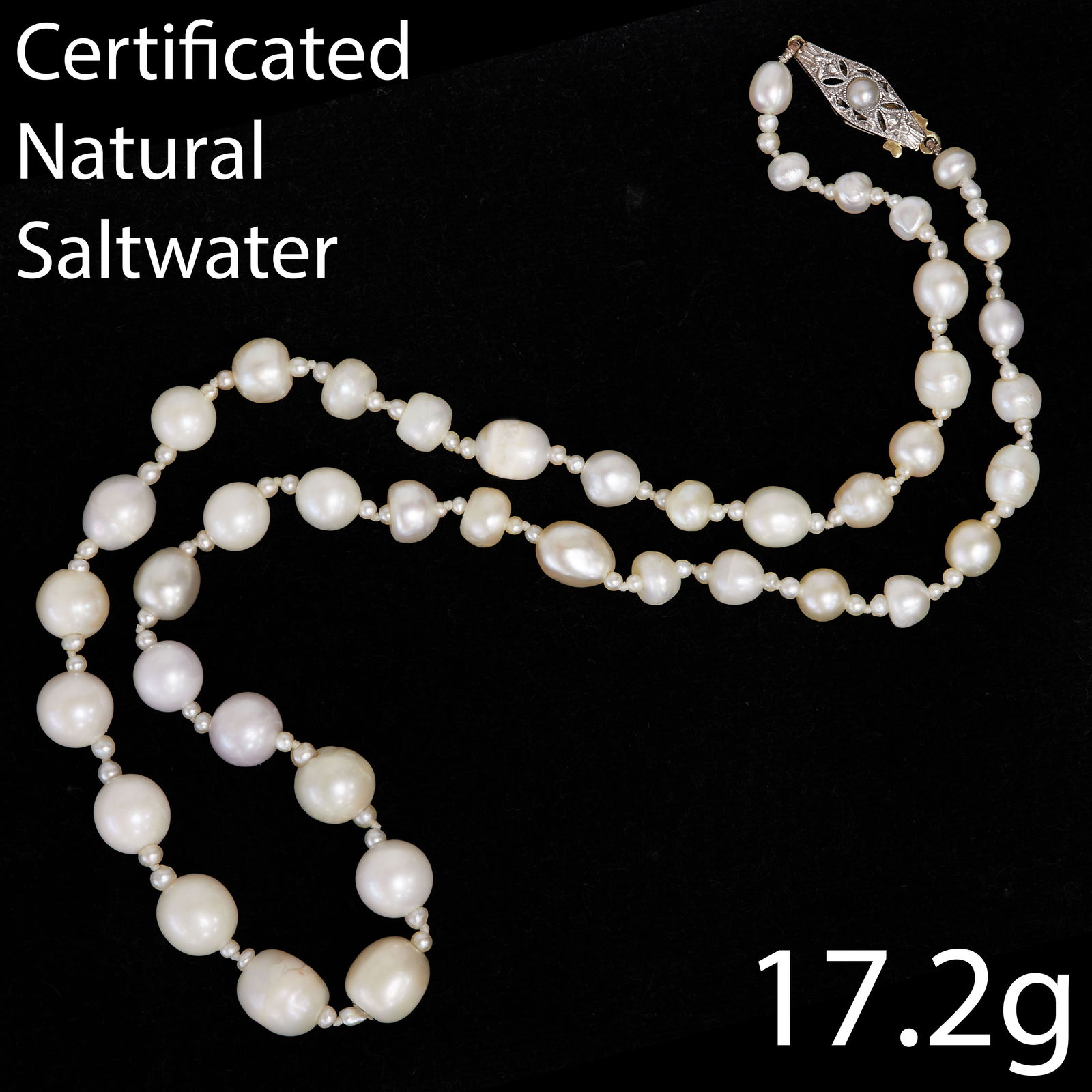 CERTIFICATED NATURAL SALTWATER PEARL NECKLACE: CERTIFICATED NATURAL SALTWATER PEARL NECKLACE,17.2 grams.The larger pearls alternated with seedpearls.Largest pearl of approx. 7.9 mm.L. 42 cm.See certificate