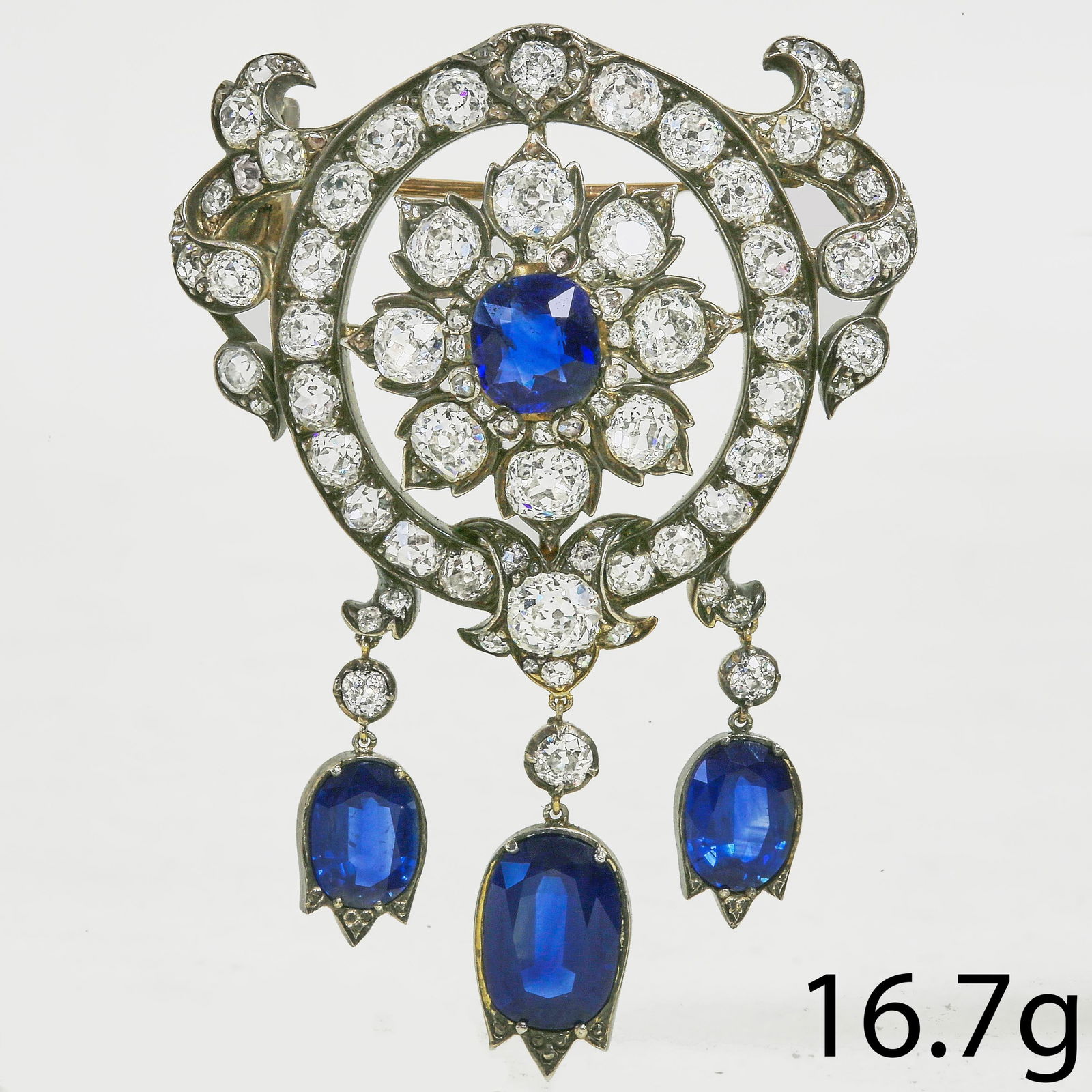 MAGNIFICENT VICTORIAN DIAMOND AND SAPPHIRE BROOCH: MAGNIFICENT VICTORIAN DIAMOND AND SAPPHIRE BROOCH 16.8 grams rich vibrant matching sapphires, approx. 6.60 ct. bright lively old cut diamonds, approx. 10 ct. L 5.8 cm W 4 cm.