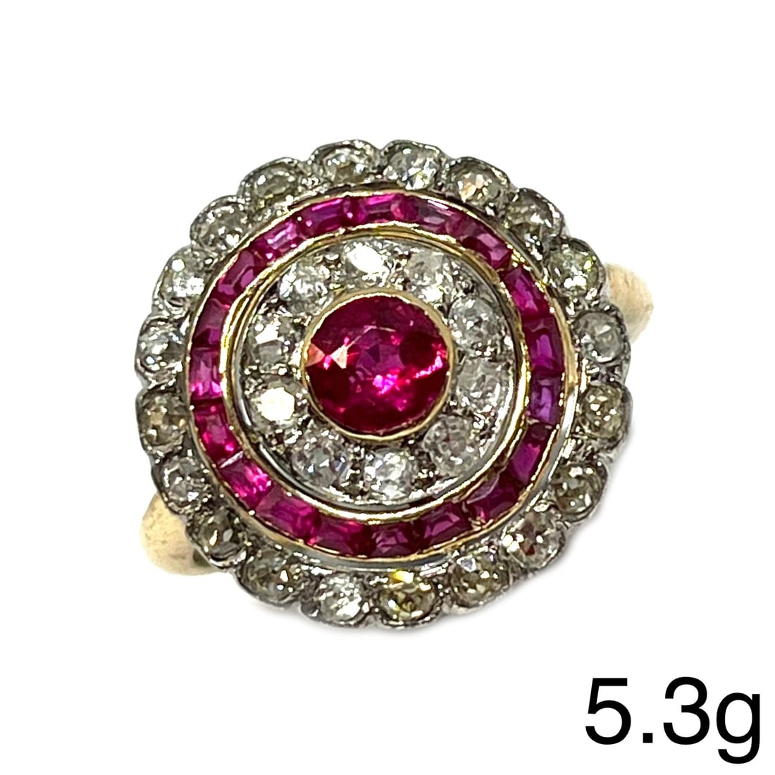 FINE ART-DECO RUBY AND DIAMOND TARGET CLUSTER RING: FINE ART-DECO RUBY AND DIAMOND TARGET CLUSTER RING,5,3 grams, testing high carat gold.Rich and vibrant rubies.Diamonds bright and lively, totalling approx. 1.60 ct.Size M 1/2.