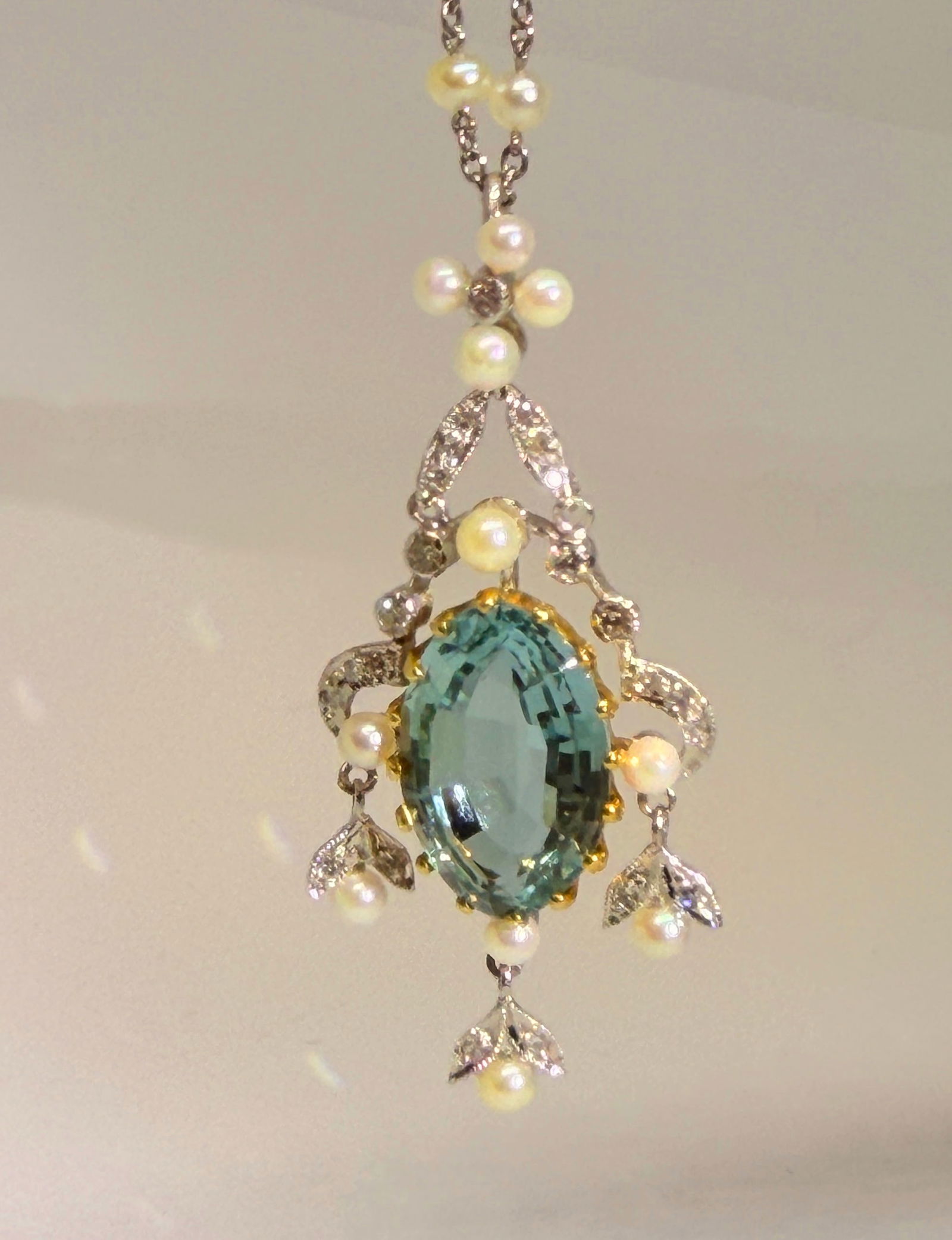 BELLE EPOQUE AQUAMARINE PEARL AND DIAMOND PENDANT WITH PEARL CHAIN NECKLACE: BELLE EPOQUE AQUAMARINE PEARL AND DIAMOND PENDANT WITH PEARL CHAIN NECKLACE,8 grams, 18 ct. gold.Rich and vibrant aquamarine of approx. 6.20 ct.Diamonds bright and lively.Generally well matched