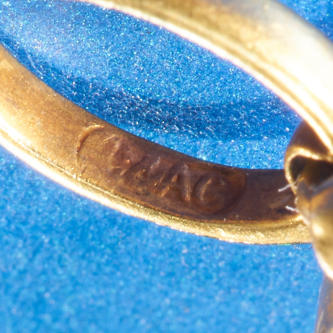 CARLO & ARTHUR GIULIANO, STAR SAPPHIRE AND ENAMEL PENDANT: CARLO & ARTHUR GIULIANO, STAR SAPPHIRE AND ENAMEL PENDANT,7.2 grams. High carat gold.Larger purpelish sapphire to the center.Sapphires totalling approx. 7.60 ct.Multi-colour enamel in good condition.M