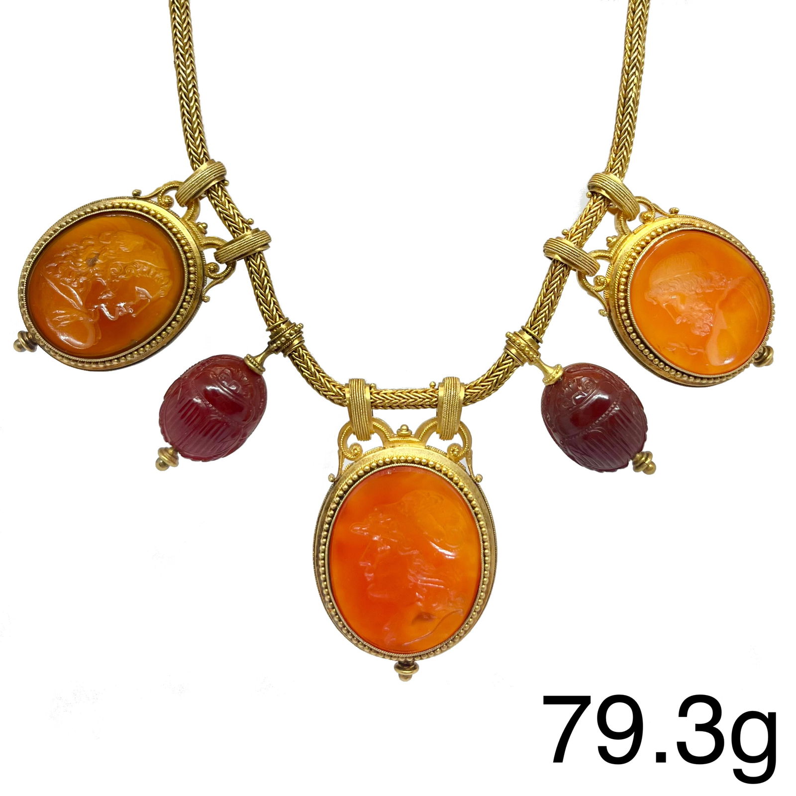 FANTASTIC ETRUSCAN REVIVAL INTAGLIO AND SCARAB NECKLACE: FANTASTIC ETRUSCAN REVIVAL INTAGLIO AND SCARAB NECKLACE,79.3 grams, 18 ct. gold. French.3 carved hard stone intaglio's, the centre likely of Minerva and one side one of mercurius.In between 2 carved h