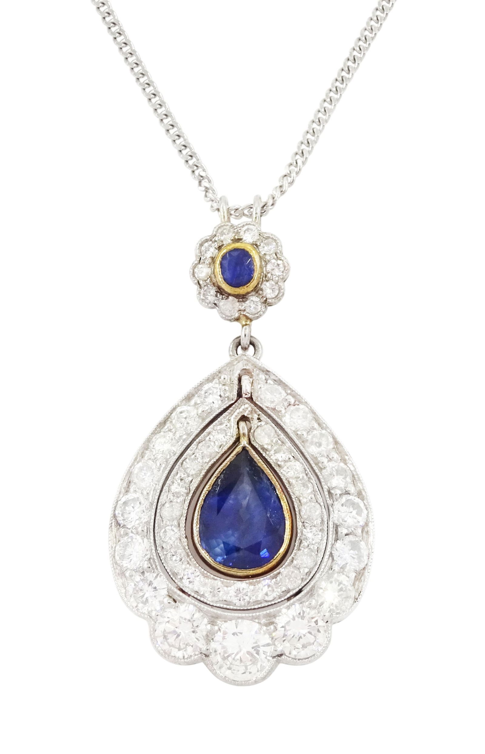 ELEGANT SAPPHIRE AND DIAMOND PENDANT NECKLACE: ELEGANT SAPPHIRE AND DIAMOND PENDANT NECKLACE 9.8 grams high carat gold bright lively sapphires, central sapphire approx 1.92 ct bright lively diamonds approx 2.50 ct pendant L 3.5 cm chain L 50 cm