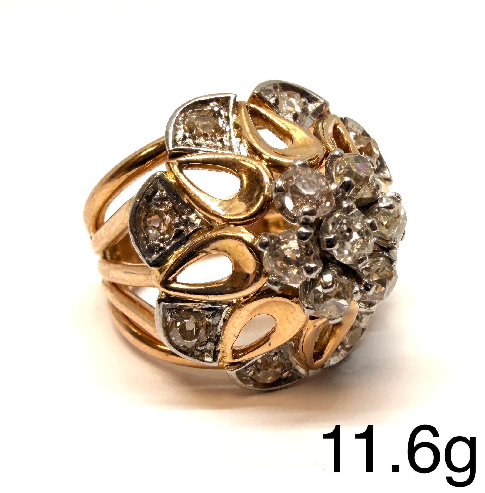 DIAMOND CLUSTER RING: DIAMOND CLUSTER RING,11,6 grams,18 ct. gold, French.Diamonds bright and lively, totalling approx. 1.20 ct.Size I.