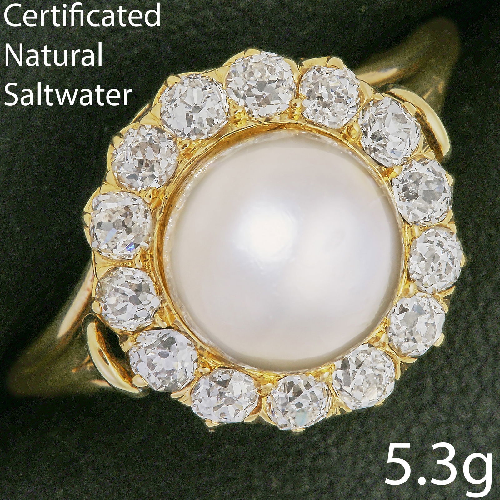 CERTIFICATED NATURAL SALTWATER PEARL AND DIAMOND CLUSTER RING: CERTIFICATED NATURAL SALTWATER PEARL AND DIAMOND CLUSTER RING,5.3 grams, testing high carat gold.Fine pearl of approx. 8.4 x 8.3 mm. (Certificated, Natural, Saltwater.)Lovely old cut diamonds.Size N 1