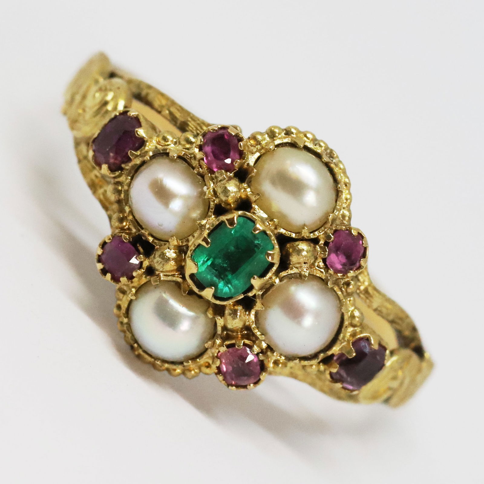GEORGIAN EMERALD RUBY AND PEARL CLUSTER RING: GEORGIAN EMERALD RUBY AND PEARL CLUSTER RING,15 ct. gold.Lovely emeralds and rubies.Pearls generally well matched, assumed to be natural.Locket back.Size Q 1/2.
