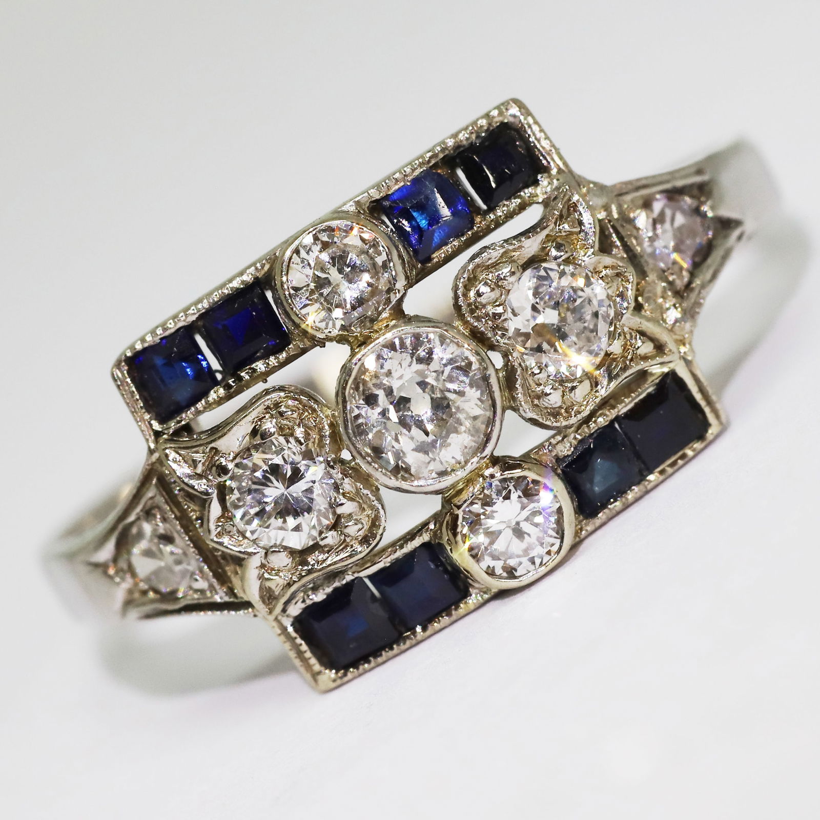 ART-DECO SAPPHIRE AND DIAMOND RING: ART-DECO SAPPHIRE AND DIAMOND RING,testing platinum.Bright and lively diamonds.Rich and vibrant sapphires.Size M 1/2.