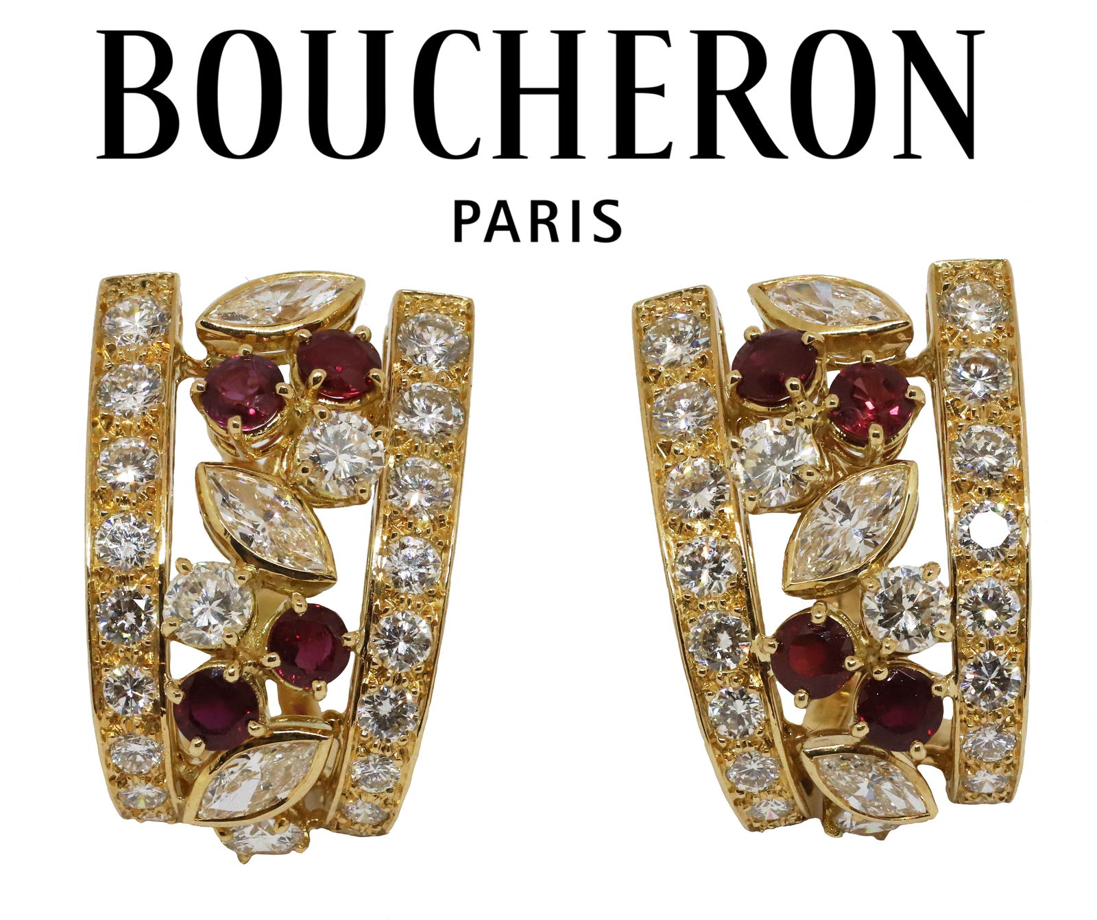 BOUCHERON, LARGE AND FINE PAIR OF RUBY AND DIAMOND EARRINGS: BOUCHERON, LARGE AND FINE PAIR OF RUBY AND DIAMOND EARRINGS,19.1 grams, 18 ct. gold. French.Set with round and marquise shaped diamonds of high colour and clarity, totalling approx. 7.10