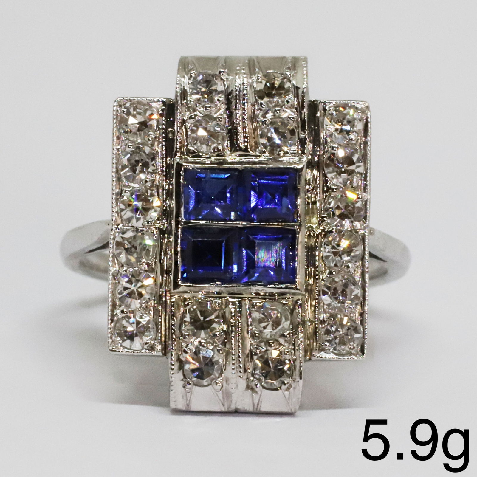 ART-DECO SAPPHIRE AND DIAMOND RING: ART-DECO SAPPHIRE AND DIAMOND RING,5,9 grams, testing high carat gold.Vibrant sapphires.Diamonds bright and lively.Size M.