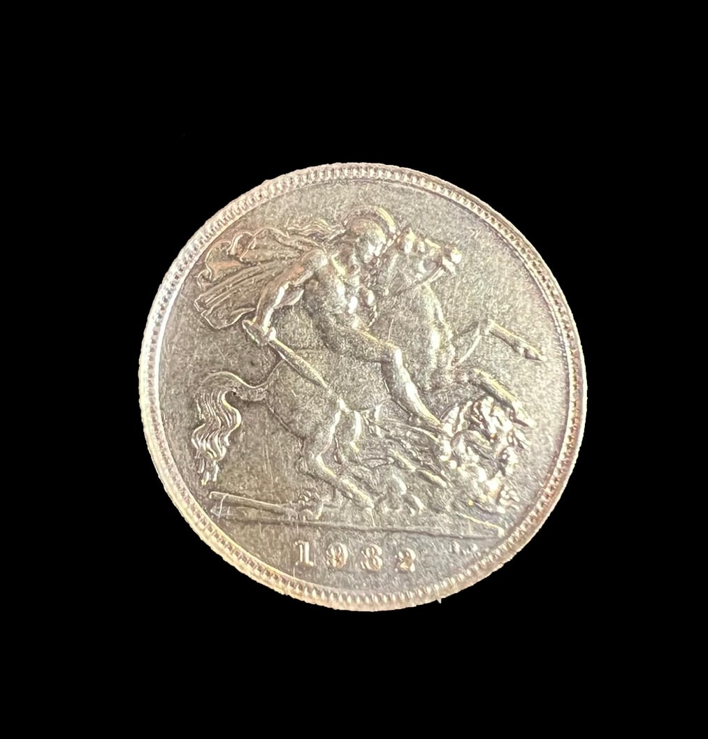 1982 Gold Half Sovereign.: 1982 Gold Half Sovereign.4.0 grams, 22ct gold. Portrait of Elizabeth II; reverse St George slaying the dragon