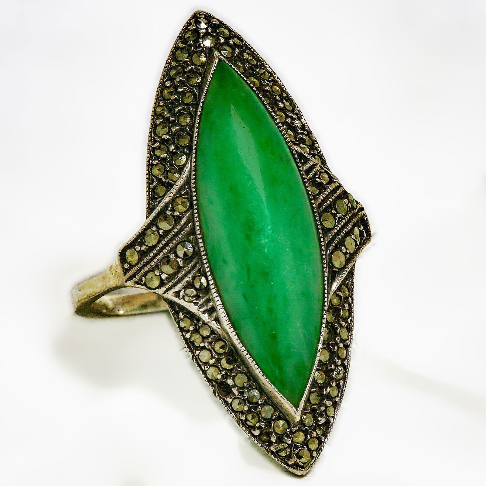 JADE AND MARCASITE UPFINGER RING: JADE AND MARCASITE UPFINGER RING 5.6 grams.Size N 1/2.