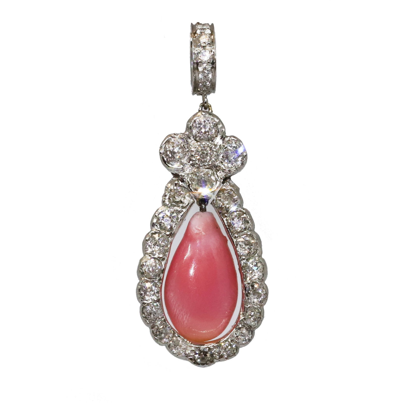 RARE CONCH PEARL AND DIAMOND DOUBLE SIDED PENDANT: RARE CONCH PEARL AND DIAMOND DOUBLE SIDED PENDANT,testing high carat gold.The pendant set to the front and back with bright and lively diamonds.Featuring a great conch pearl with great colour and nice
