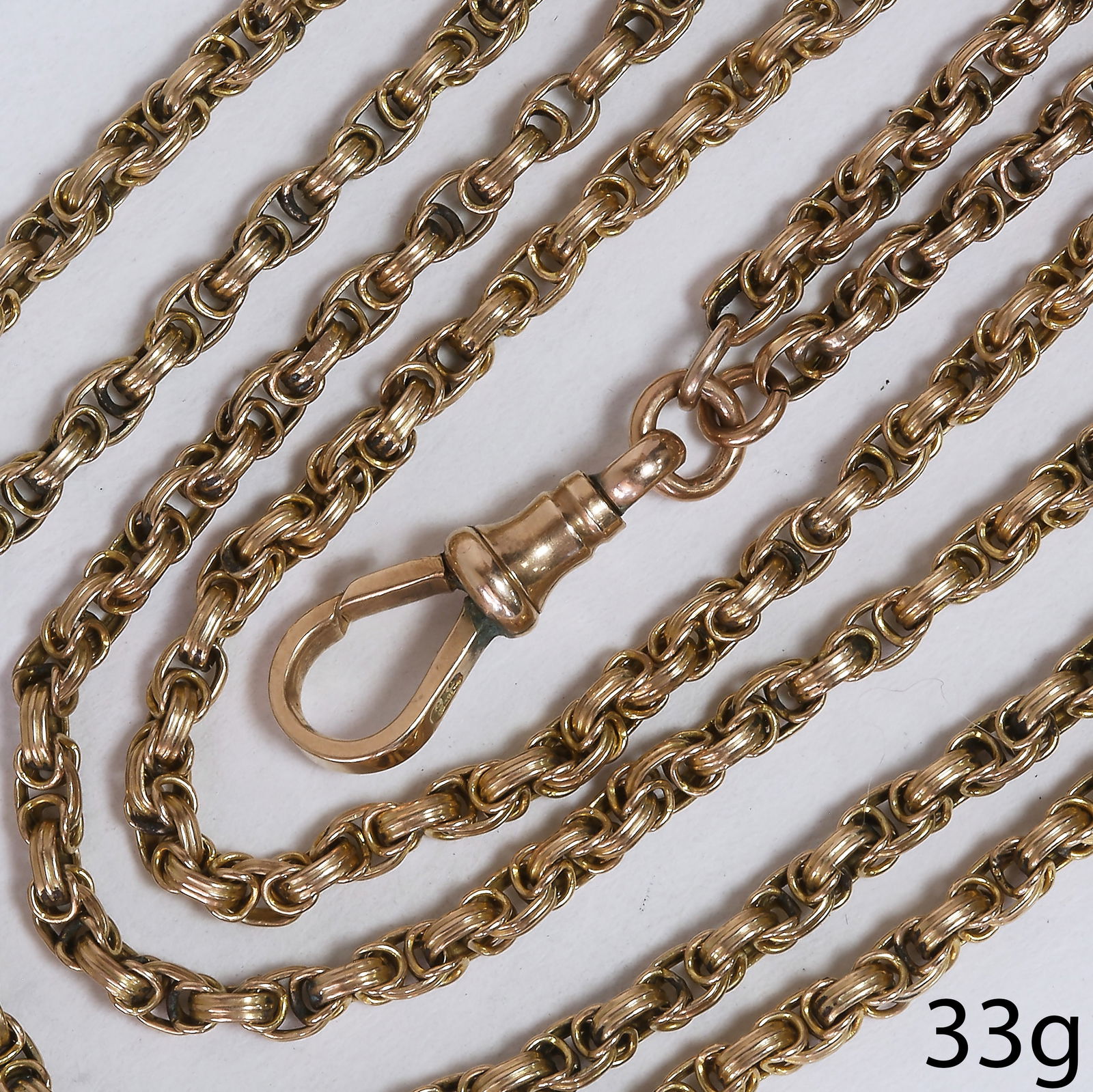 A VICTORIAN GOLD GUARD CHAIN (1 of 1)