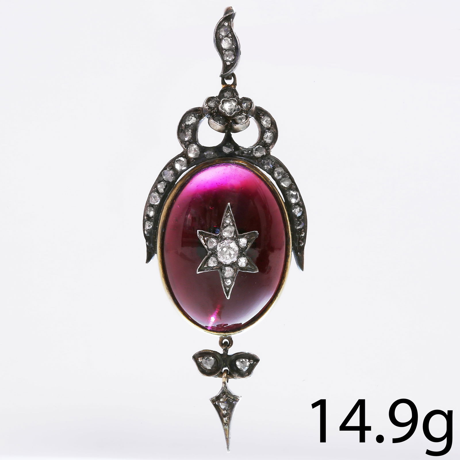 VICTORIAN GARNET AND DIAMOND PENDANT: VICTORIAN GARNET AND DIAMOND PENDANT,14.9 grams.Fine garnet, approx. 23.5 mm.L. 6.3 cm.