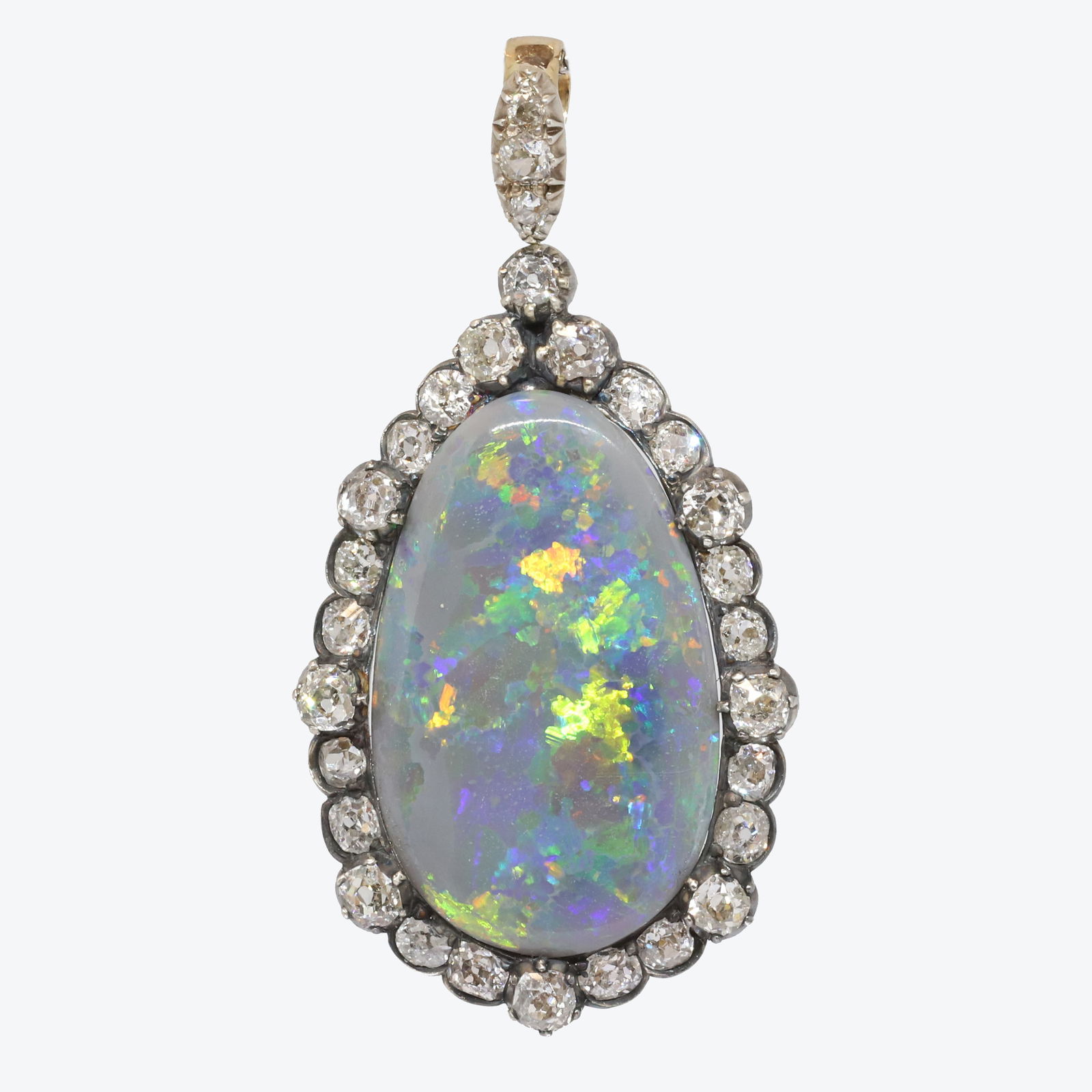 FANTASTIC ANTIQUE BLACK OPAL AND DIAMOND PENDANT: FANTASTIC ANTIQUE BLACK OPAL AND DIAMOND PENDANT,8,5 grams, testing high carat gold and silver.Fantastic large black opal of approx. 16 ct. with great play of colour.Bright and lively old cut diamonds