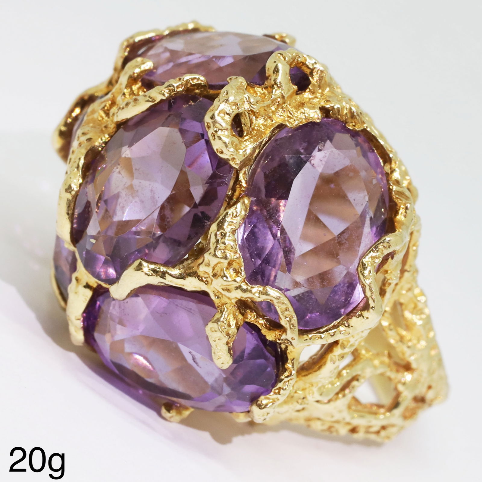 RETRO/MODERNIST AMETHYST RING: RETRO/MODERNIST AMETHYST RING,20 grams, testing high carat gold.set with 5 large oval amethyst.Size N.