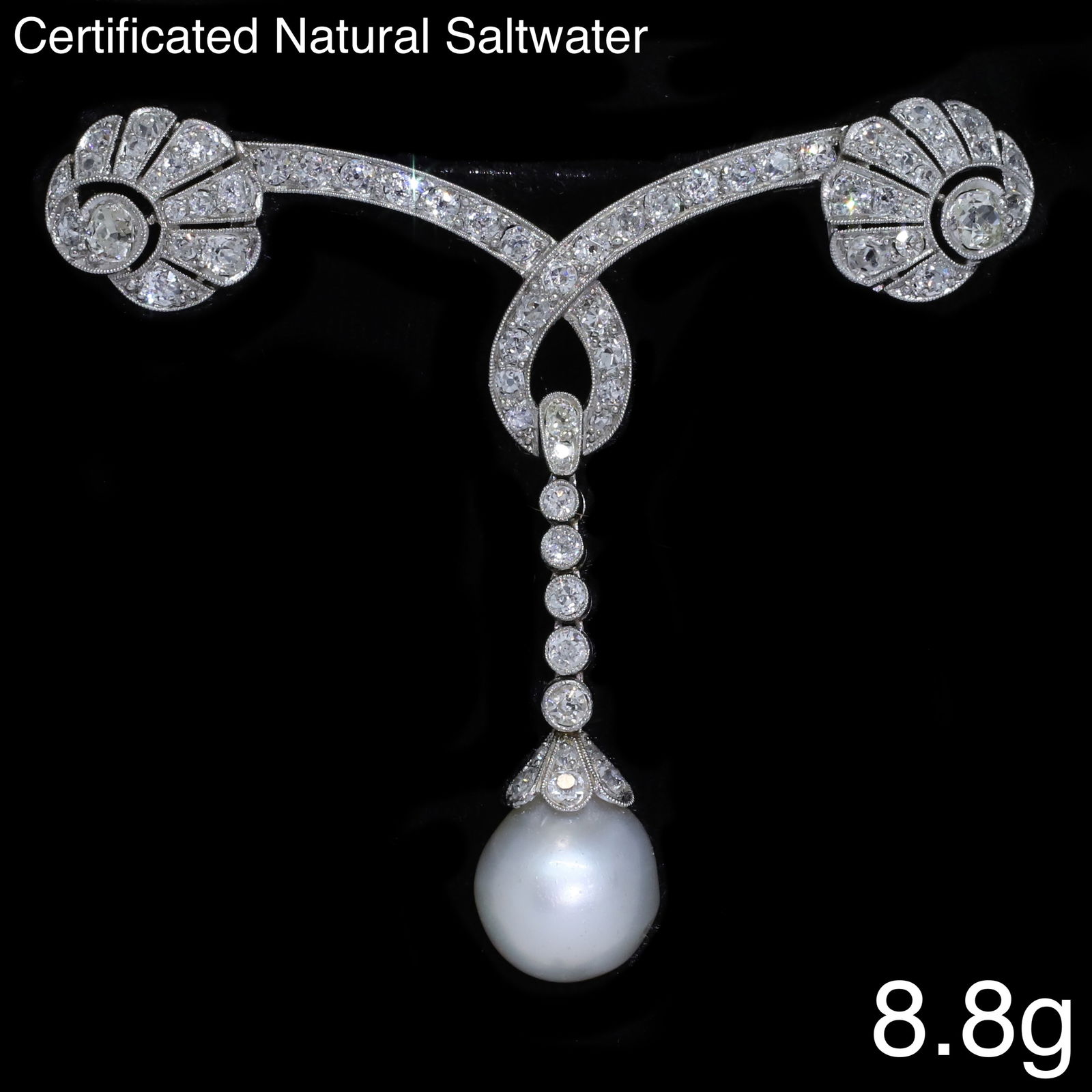 FINE BELLE EPOQUE CERTIFICATED NATURAL SALTWATER PEARL AND DIAMOND BROOCH: FINE BELLE EPOQUE CERTIFICATED NATURAL SALTWATER PEARL AND DIAMOND BROOCH,8.8 grams, testing platinum.Suspending a fine pearl of approx. 11.58 x 9.89 x 9.42 mm. (Certificated, Natural saltwater).The d