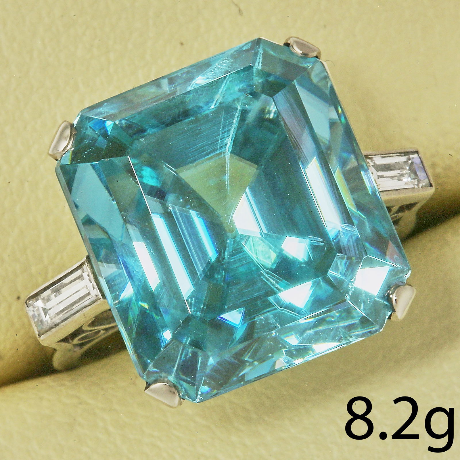 FANTASTIC ART-DECO ZIRCON AND DIAMOND RING: FANTASTIC ART-DECO ZIRCON AND DIAMOND RING 8.2 grams platinum rich vibrant zircon with no abrasions approx 19.33 ct bright lively diamondsfine craftsmanship size I 1/2 in an antique box