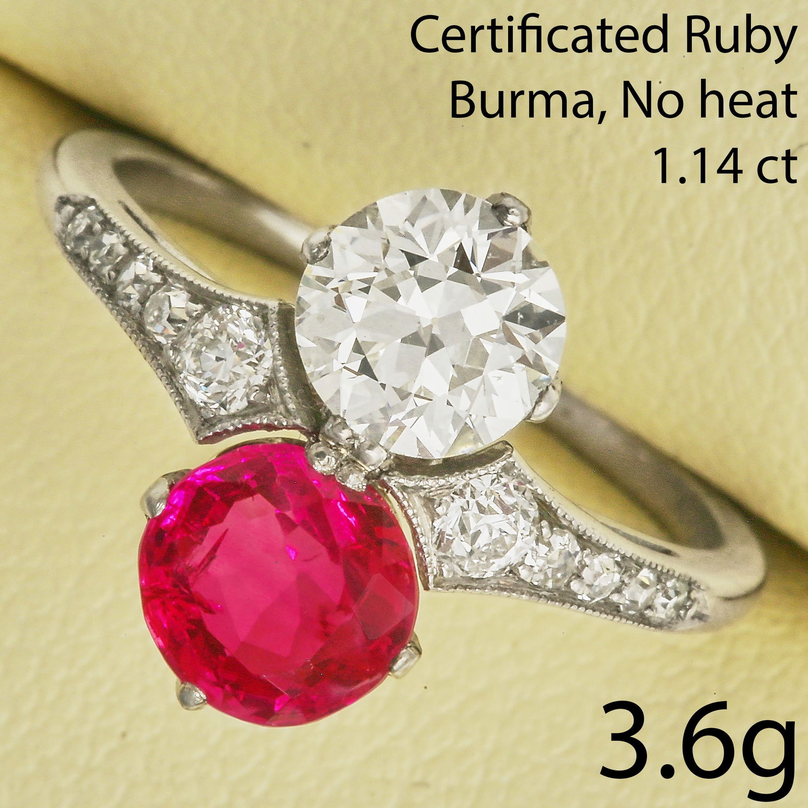 CERTIFICATED BURMA RUBY AND DIAMOND RING: CERTIFICATED BURMA RUBY AND DIAMOND RING,3,6 grams, testing platinum.Fine Burma ruby of approx. 1.14 ct. (Certificated, Burma, Mogok, No heat).Bright and lively diamond of approx. 0.76 ct.Size K.See c
