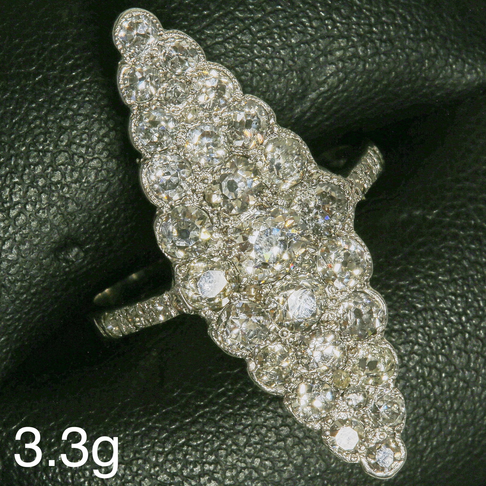 FINE MARQUISE SHAPED DIAMOND RING: FINE MARQUISE SHAPED DIAMOND RING,3,3 grams, 18 ct. gold.Bright and lively old cut diamonds, totalling approx. 2.20 ct.L. head 3.1 cm.Size O.