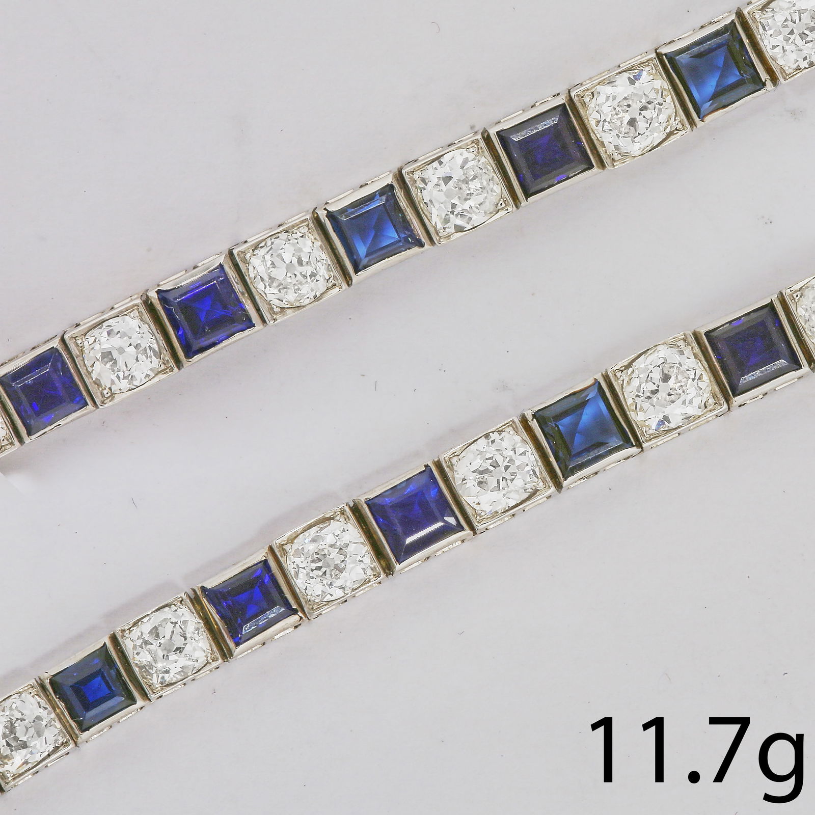 ART-DECO SAPPHIRE AND DIAMOND BRACELET: ART-DECO SAPPHIRE AND DIAMOND BRACELET,11,7 grams, testing high carat gold.Rich and vibrant sapphires, totalling approx. 4 ct.Diamonds bright and lively, totalling approx. 4.60 ct.L. 18 cm.